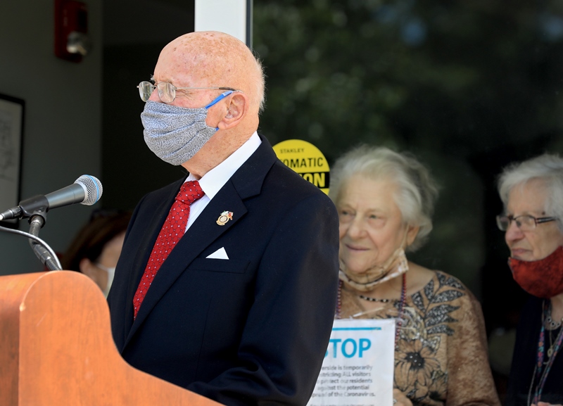 James Hall speaking to crowd