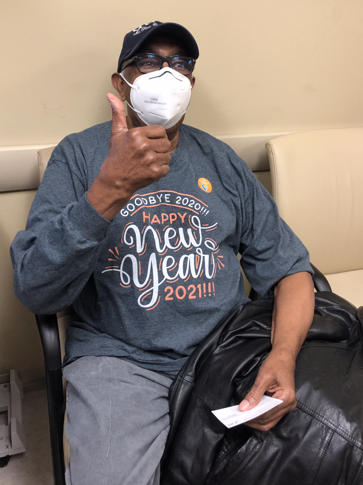 man getting COVID vaccine