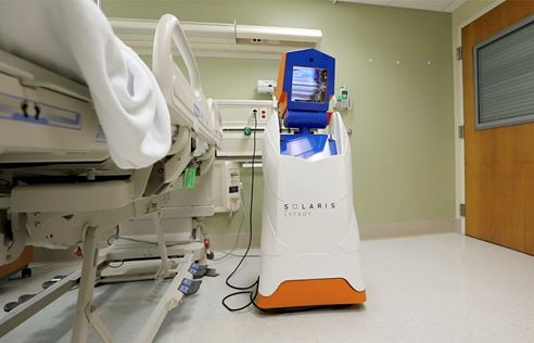 UV machine sanitizing hospital room