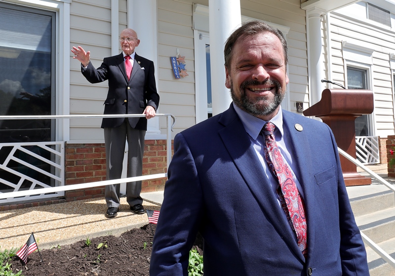 Delegate Keith Hodges taking photo with James Hall