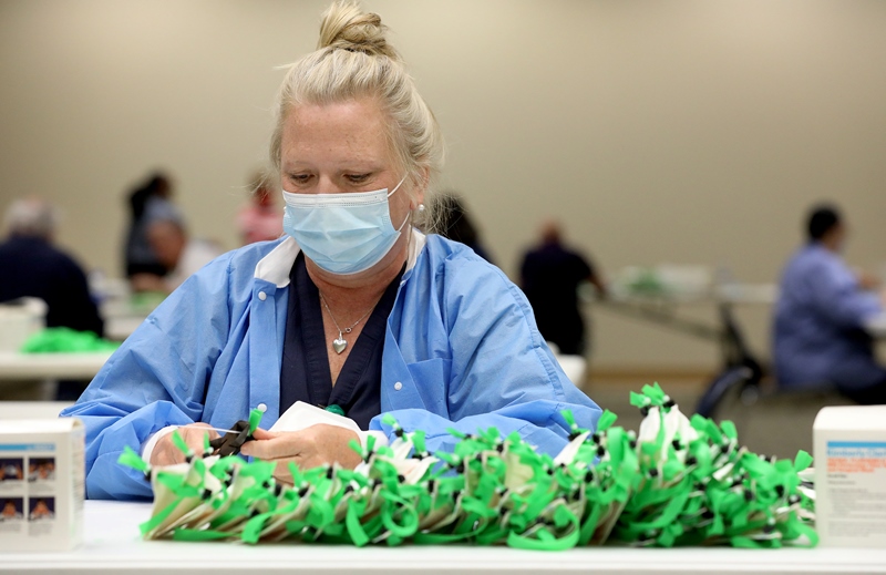 Woman repairing N95 masks