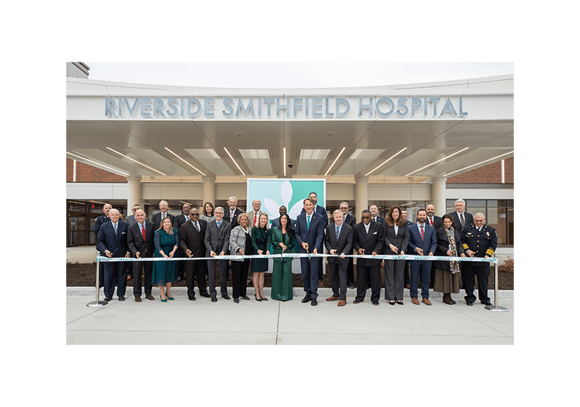 people cut riverside health ribbon in front of riverside smithfield hospital 