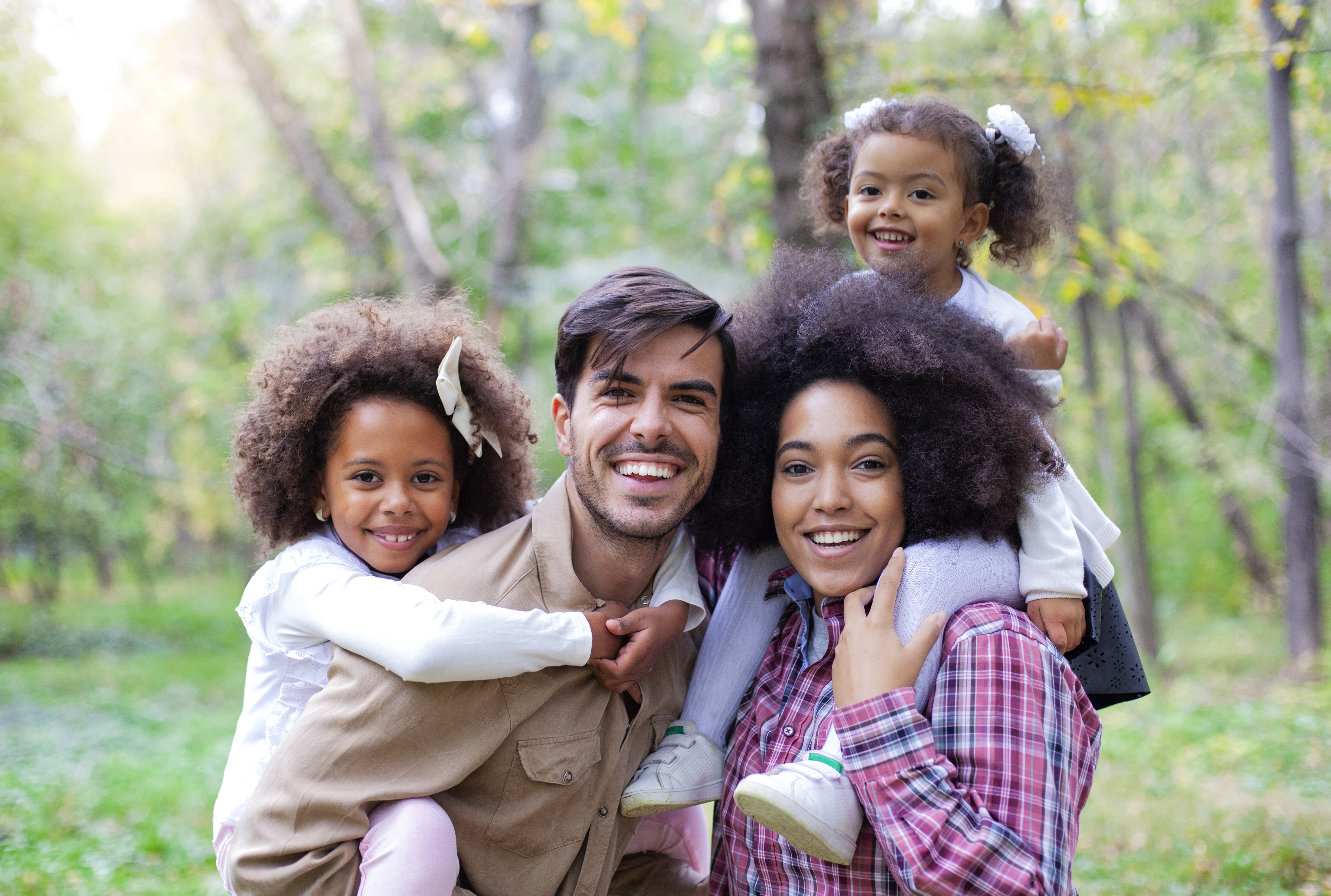 Family outdoors playing