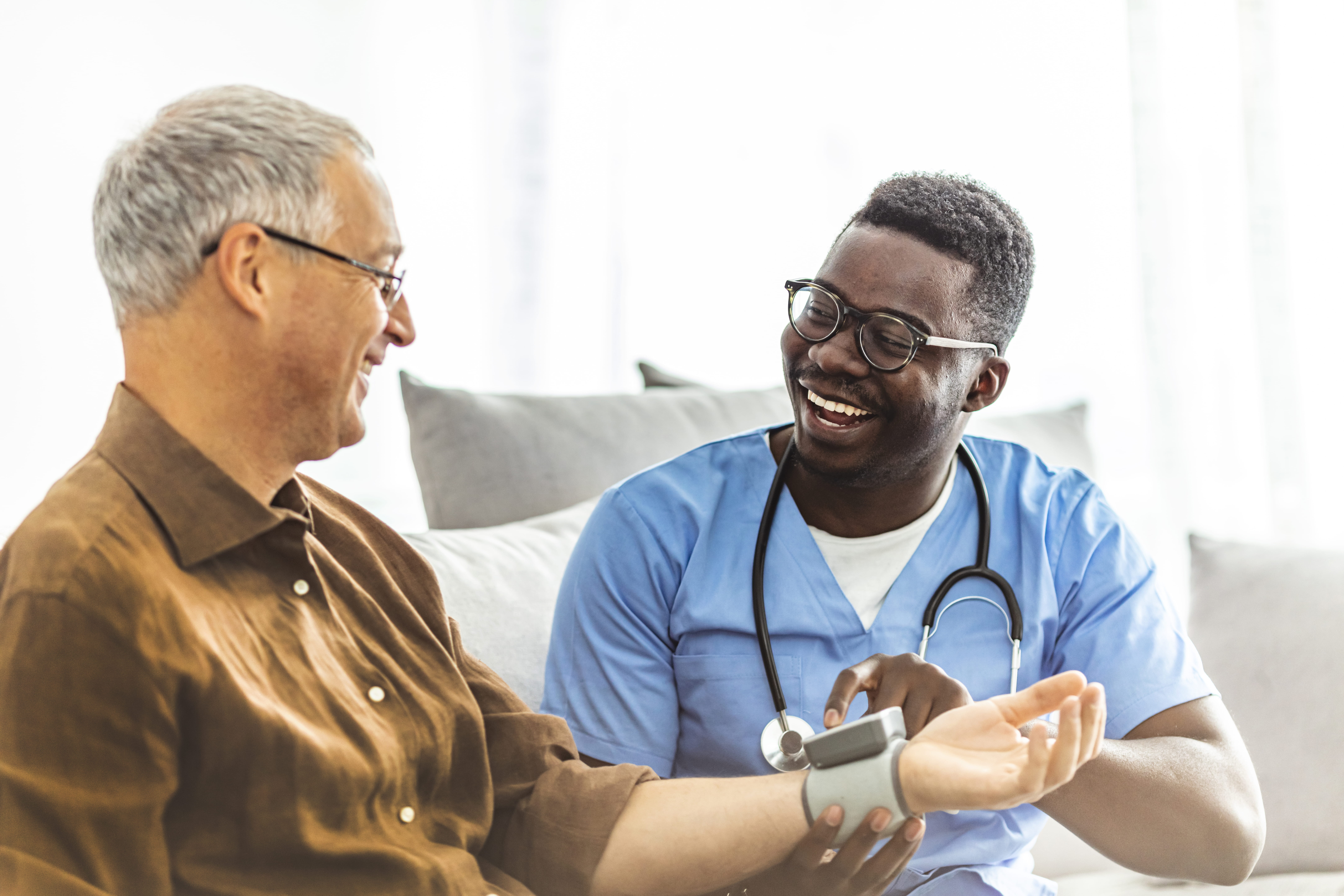 Health nurse taking pulse on a patient