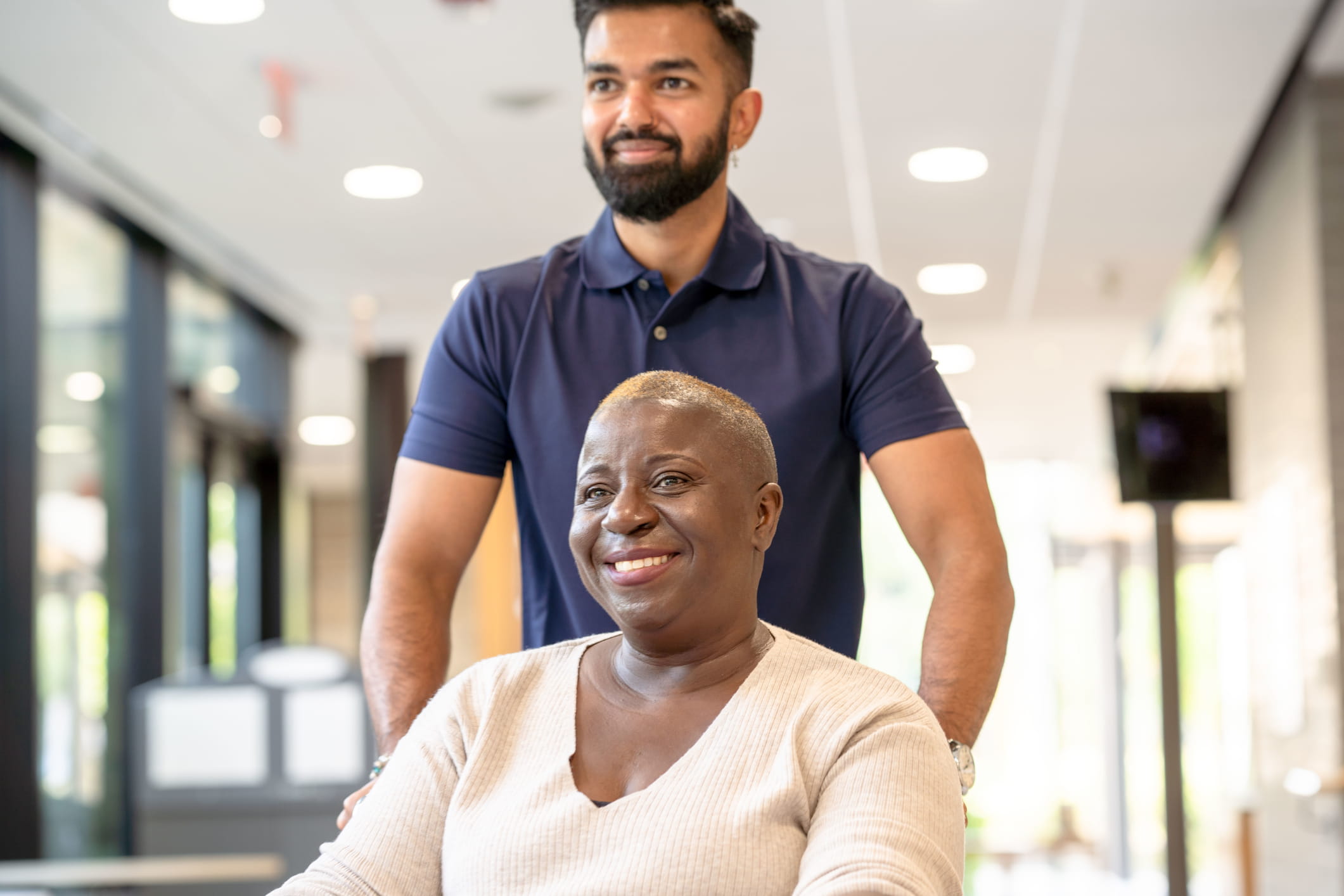 Which At Home Service Is Right For Me? Women being wheeled out of hospital