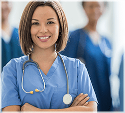 Confident happy nurse with stethoscope