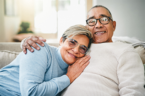 Shot of a senior couple relaxing on the couch at home