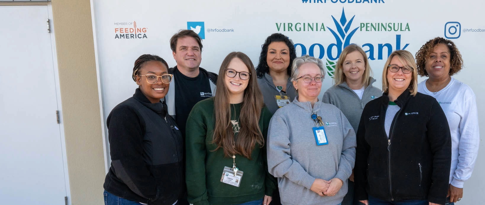 Group of Riverside employees posing for a picture v4
