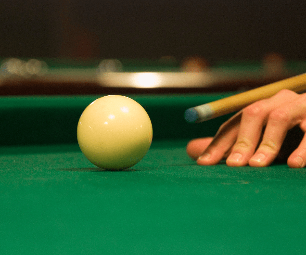 cue ball on green pool table