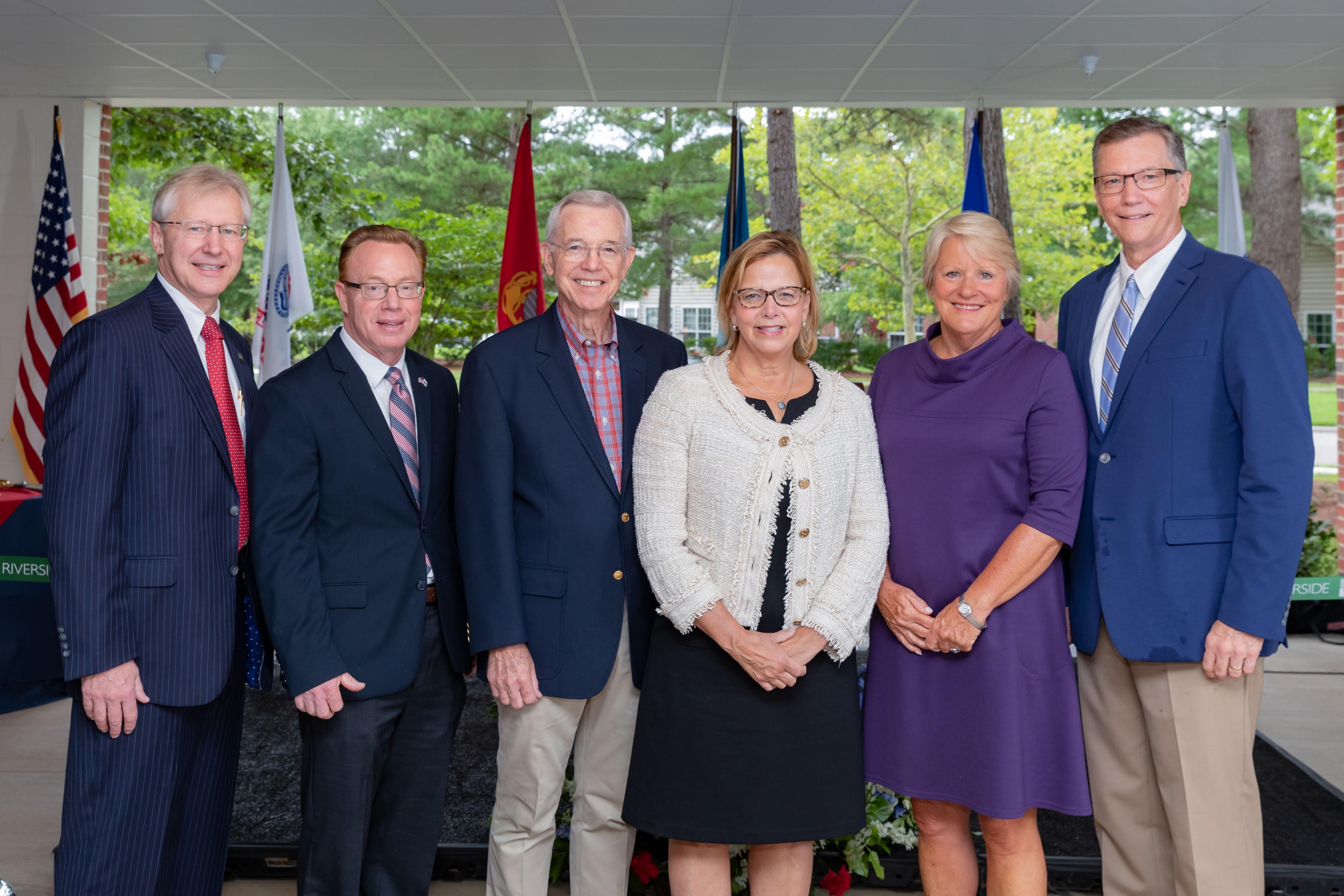 Dignitaries and officials celebrate the opening of Presidents Pavilion at Patriots Colony At Williamsburg