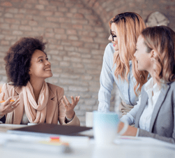group of diverse professional women talking