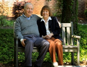 Doran family sitting on a bench outside