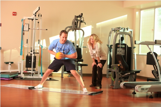 Trainer watching workout