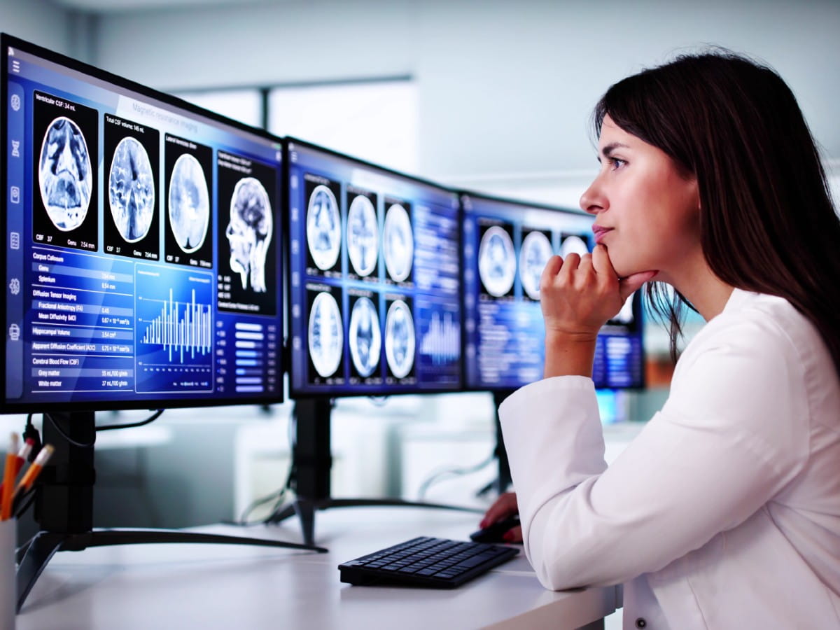 Riverside Neurological and Spine Institute Brain Surgeon Or Neurologist Doctor Studying MRI Scans