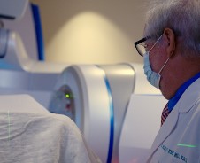 provider looking at ct scanner