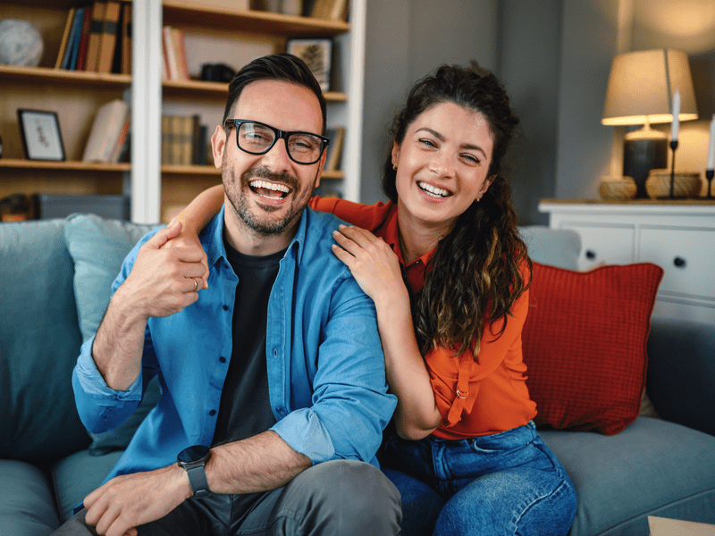 Shot of an affectionate young couple relaxing at home