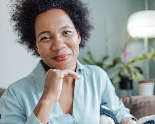 Portrait of African-American young woman at home
