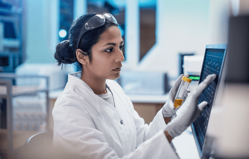 Female Scientist Working in The Lab, Using Computer Screen