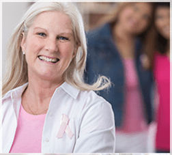 smiling woman in pink