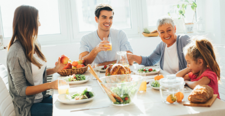 Young-family-eating-with-grandma_2