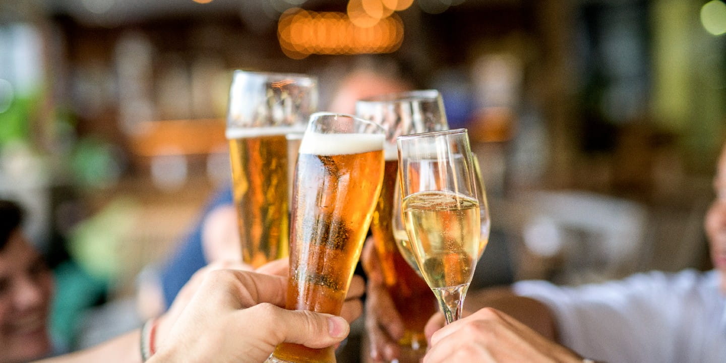 Friends toasting drinks