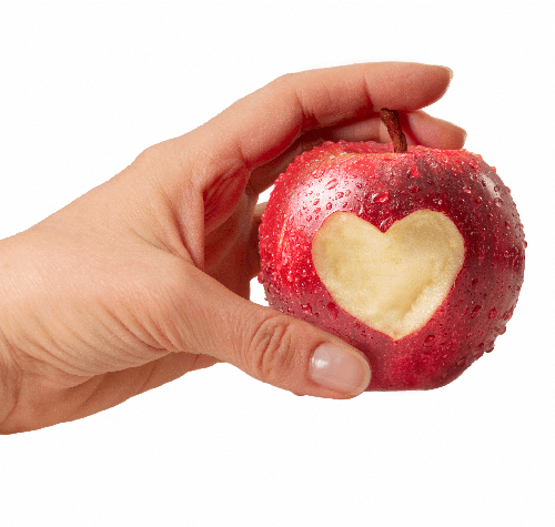 Female hand holding red apple with heart symbol isolated 