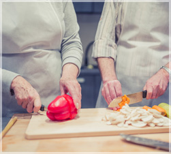 Women cutting vegetables