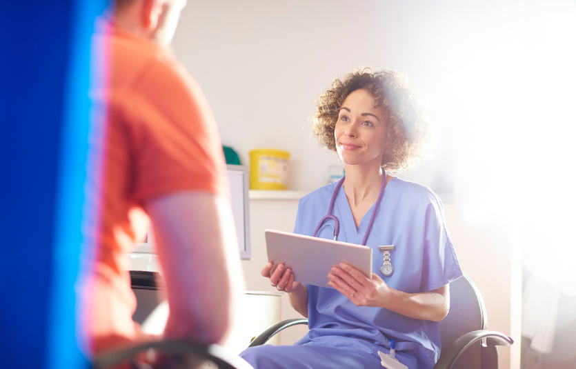 Nurse talking to patient