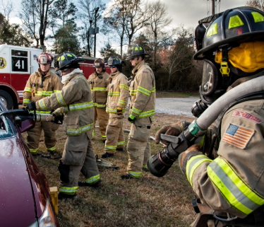 a group of firefighters performing a rescue 