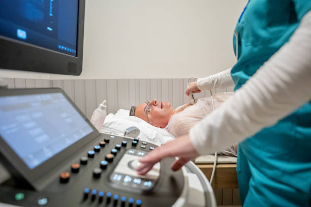 Mature man taking an echocardiogram