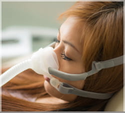 Woman undergoing anesthesia