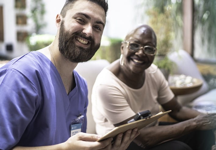 Smiling healthcare worker and patient