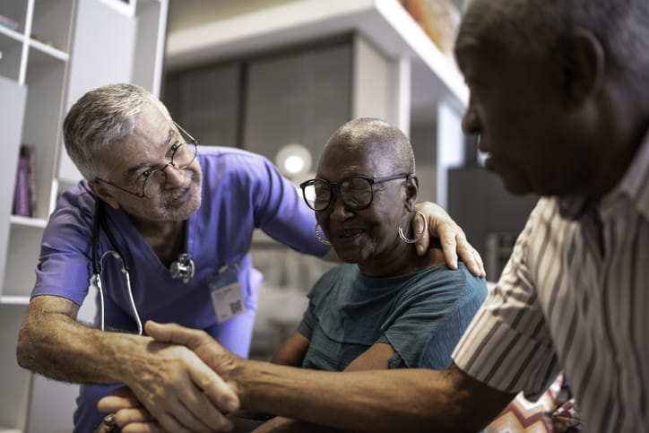 doctor and elderly couple