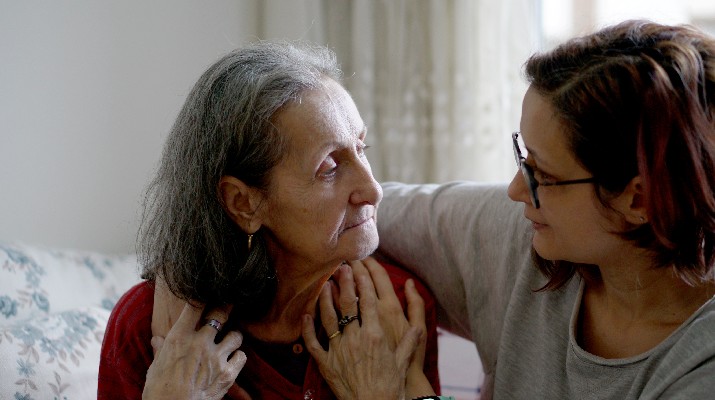Woman hugging her elderly mother Neuro Spine Memory Care Understanding