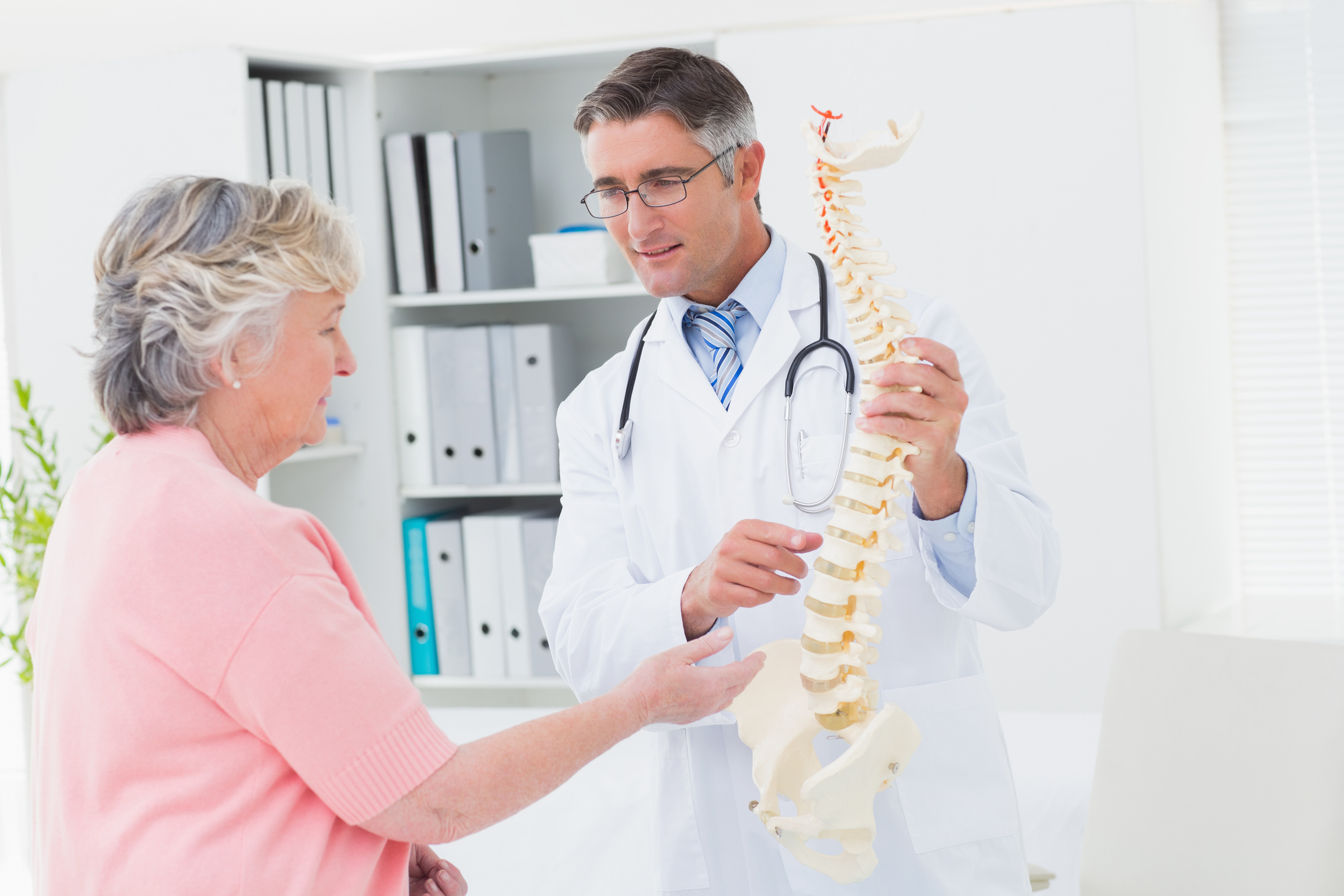 doctor and patient back pain