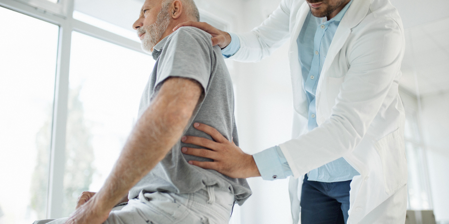 a physician managing back pain for a patient