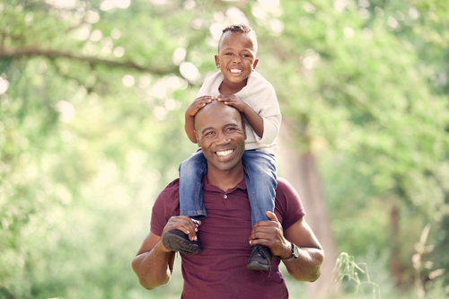father and son with a healthy spine are being a little adventurous today