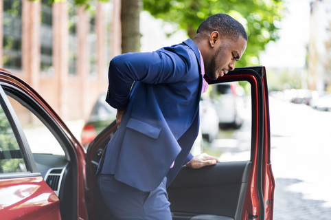 Car Driving Pain Back Injury. Bad Posture