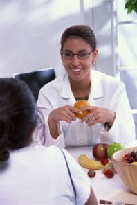 Dietician counseling patient