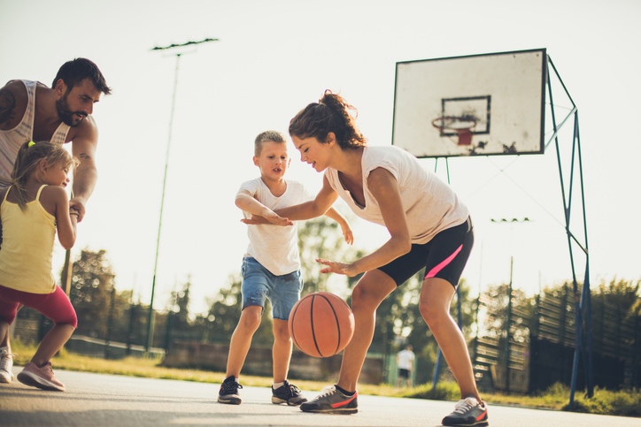 Sports Medicine Specialists Family playing basketball