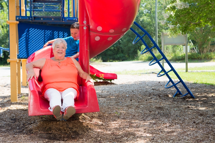 Leah in the playground with her grandson