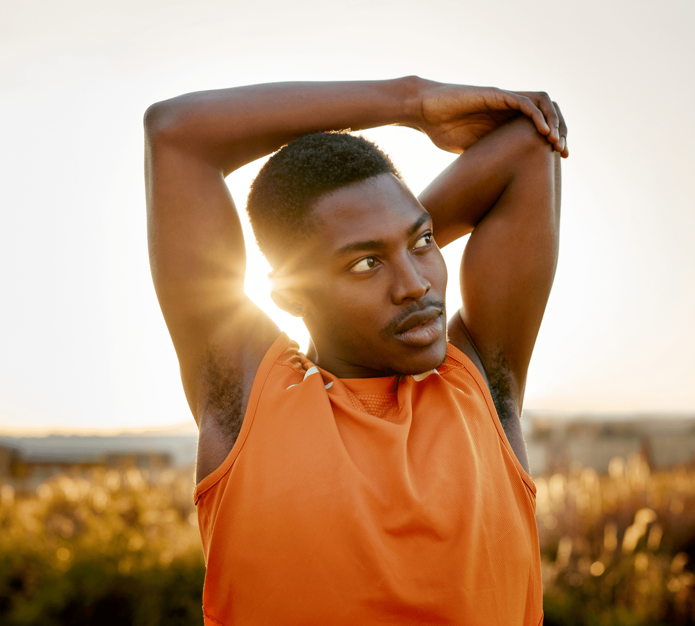 a man stretching his shoulder and elbow
