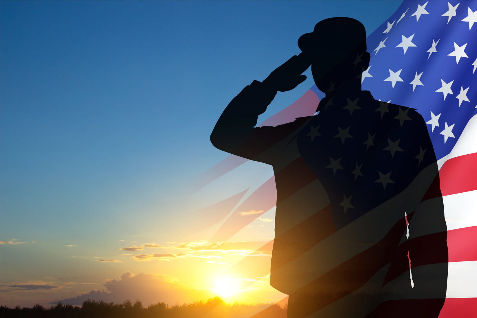 Silhouette of a saluting soldier against a sunset, with an American flag overlay. The scene conveys patriotism and honor.