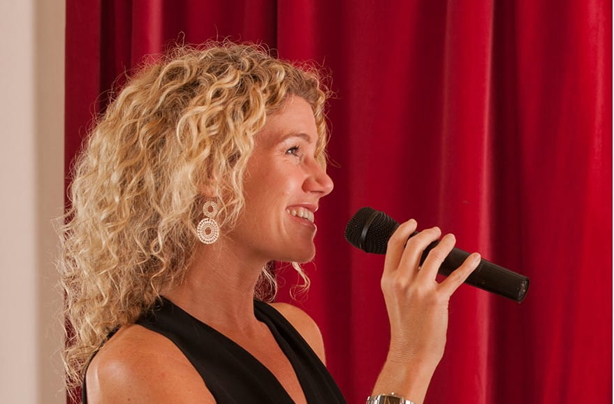 Woman singing with microphone