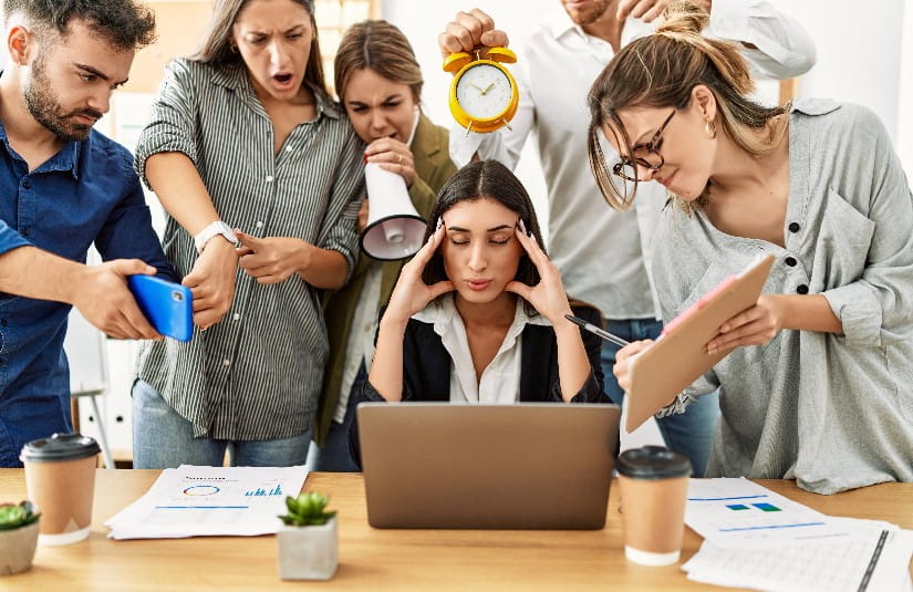 Primary Care Group of business workers screaming to stressed partner at the office