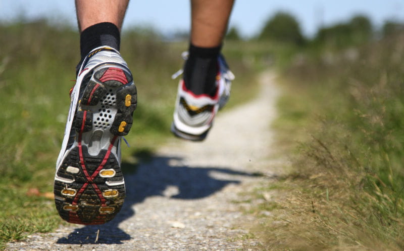 running shoes in the grass