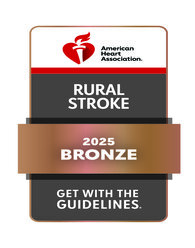 Bronze award badge from the American Heart Association for "Rural Stroke 2025 Get With The Guidelines," featuring a red heart and torch logo.