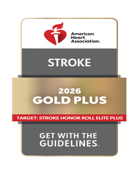 American Heart Association 2026 Gold Plus award badge for stroke, featuring a red heart and torch logo, on a black background.