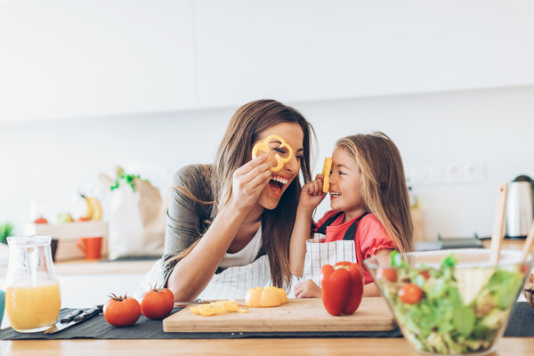 Mother and daughter having fun