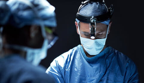 Cropped shot of surgeons performing a surgical procedure